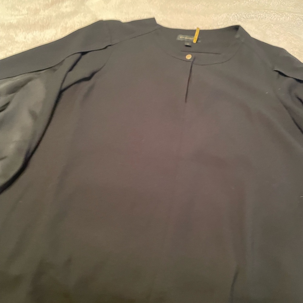 Beautiful black Donna Karan open sleeve blouse.